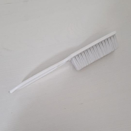 Spazzola pulizia cacca pannolini lavabili bianca