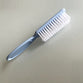 Spazzola pulizia cacca pannolini lavabili azzurra