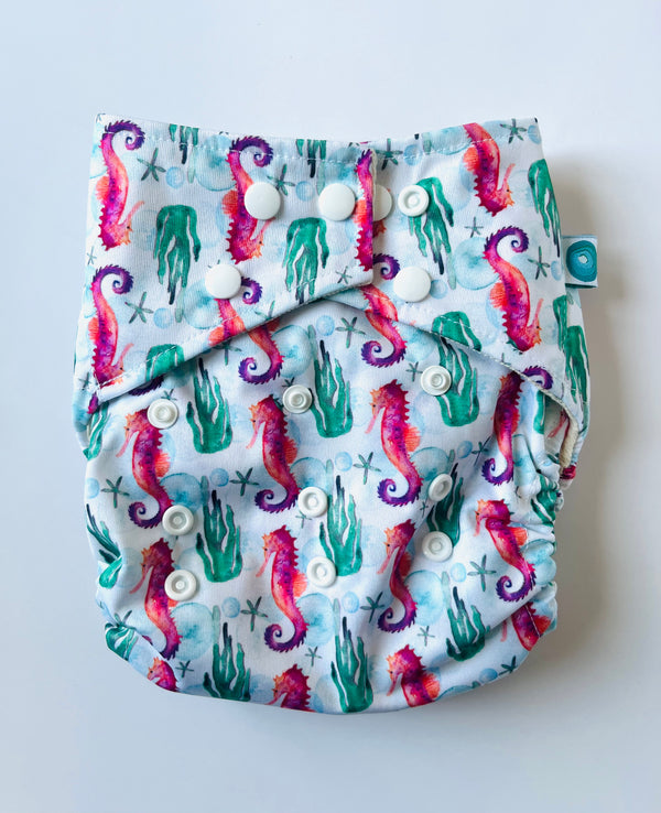 EcoTiny - pocket con tasca in cotone cavalluccio marino