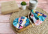 Bloom pads - 5 dischetti struccanti piume glitterate in bamboo con sacchettino